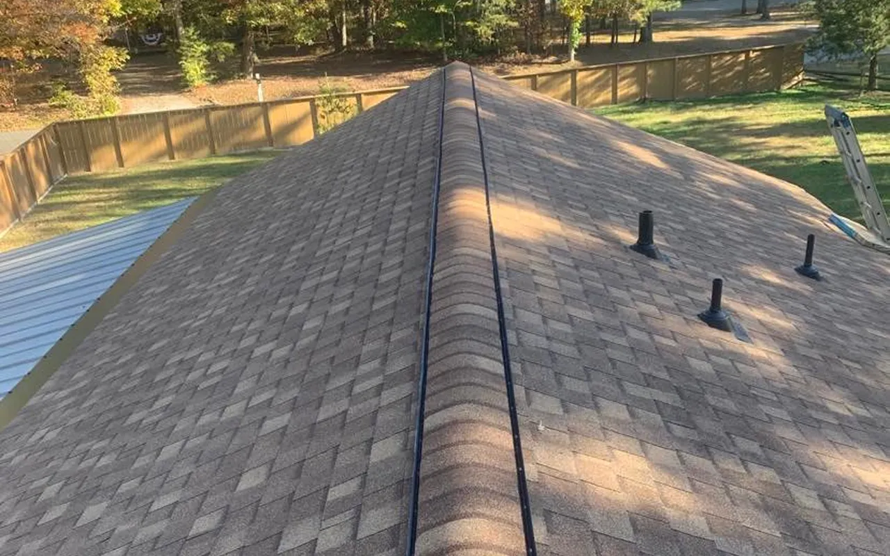 New architectural shingle roof with ridge vents installed by Storm Shield Roofing